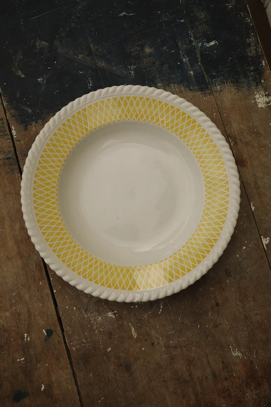 Assiette creuse jaune et blanche